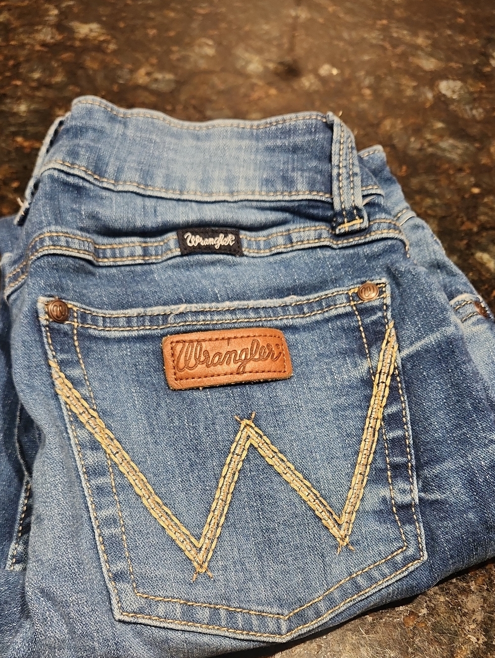 Wrangler Women’s Blue Boot Cut Jeans with Tan Patch